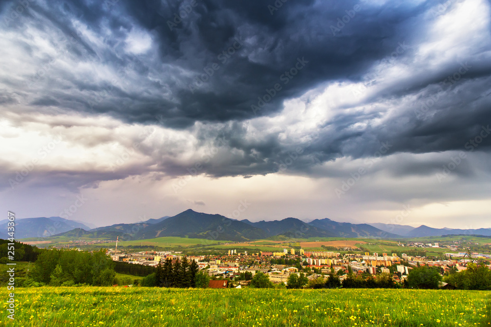 Spring storm in mountains. Overcast dramatic sky