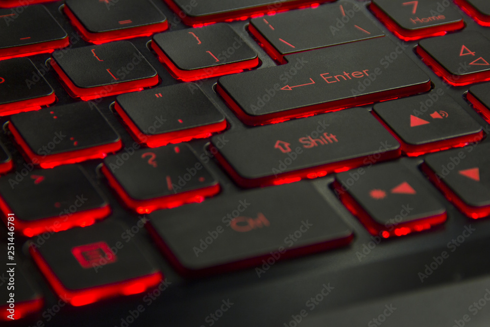 black keyboard of the game laptop with red illumination black keyboard of the game laptop with red illumination