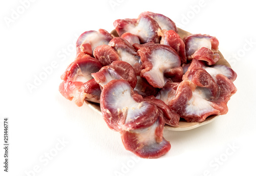 Raw Chicken gizzards isolated on white background. photo