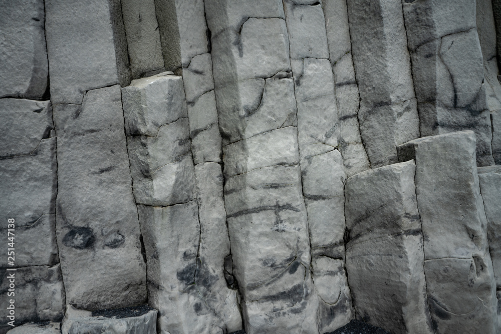 Basalt volcanic rock formations in Reinisfjara beach near Vik in northern Iceland Basalt volcanic rock formations in Reinisfjara beach near Vik in northern Iceland