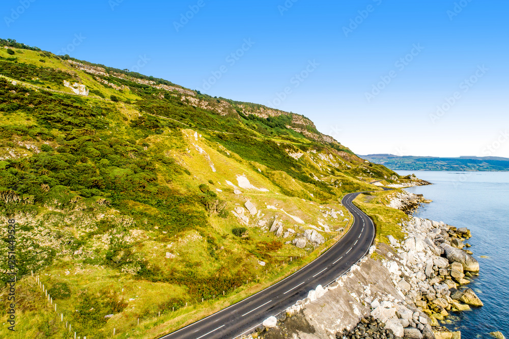 Northern Ireland, UK. Causeway Coastal Route a.k.a Antrim Coast Road. One of the most scenic coastal roads in Europe. Aerial view
