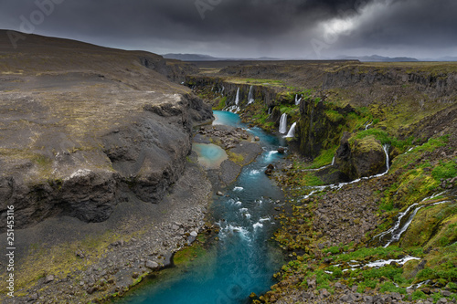 Iceland - Landmannalaugar - Valley of tears watefall canyon -Sigöldugljufur multiple waterfall canyon with storm approaching