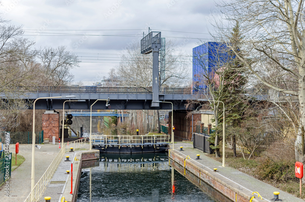  Landwehr Canal with its Lower Lock and a pink pipe of the circulating channel  in Berlin, Germany