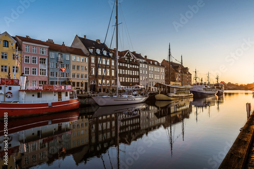 Colourful houses in the sunrise along the quay at Nyhavn Copenhagen