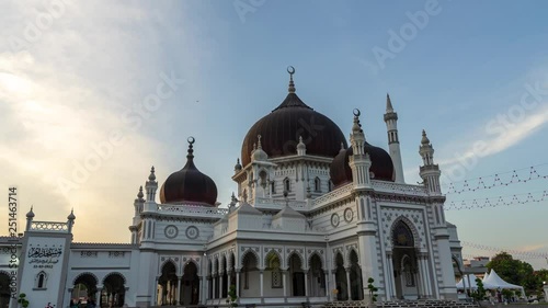 KUALA LUMPUR, MALAYSIA - 24th JAN 2019; 4K Time lapse of moving cloud over mosque Zahir in Kedah, Malaysia. photo