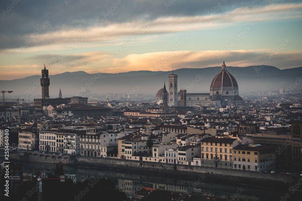 A postcard of Florence at sunset with nice warm tones and an incredible sky