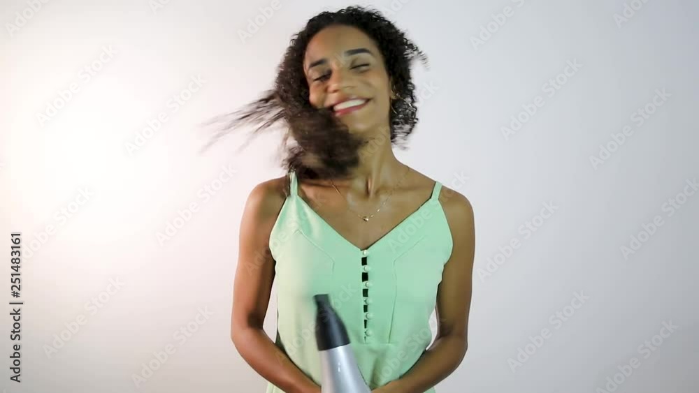 African American girl with afro hair on white background. Brazilian girl. African American girl with afro hair on white background. Brazilian girl.