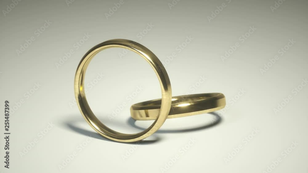 Pair of a 3D golden Wedding ring. Alliances. Relationship rings on a white background Pair of a 3D golden Wedding ring. Alliances. Relationship rings on a white background