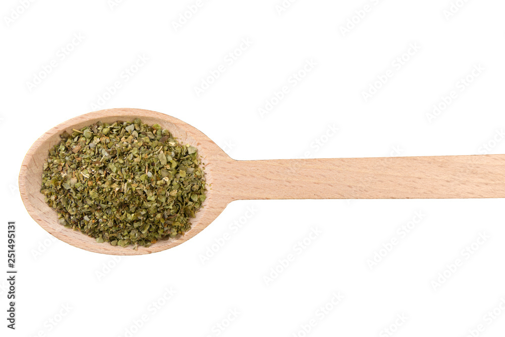 marjoram herb in wooden spoon isolated on white background marjoram herb in wooden spoon isolated on white background