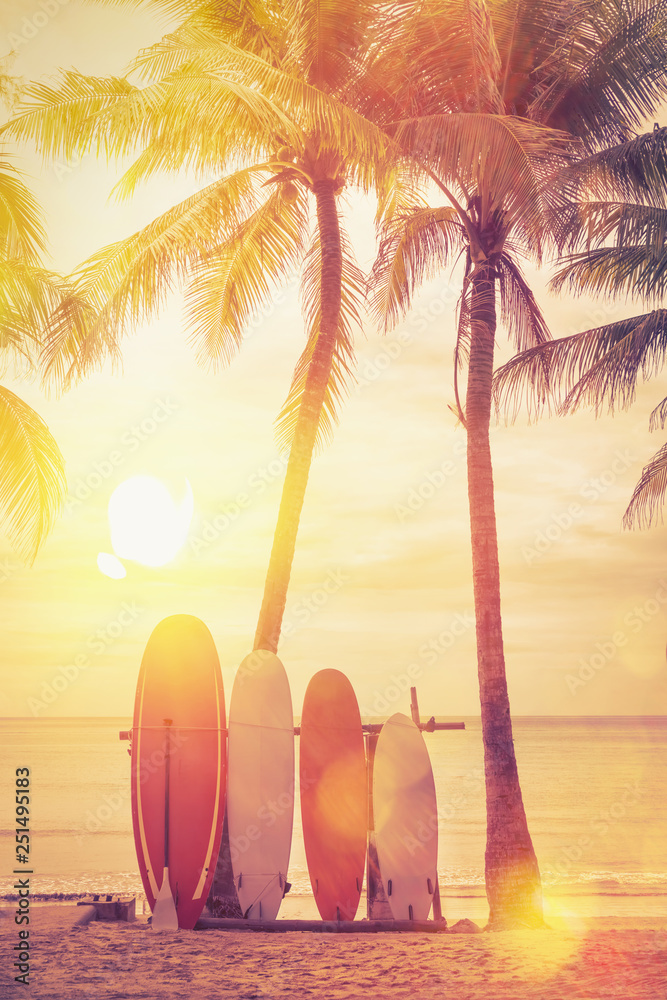 Surfboard and palm tree on beach background. Stock Photo | Adobe Stock
