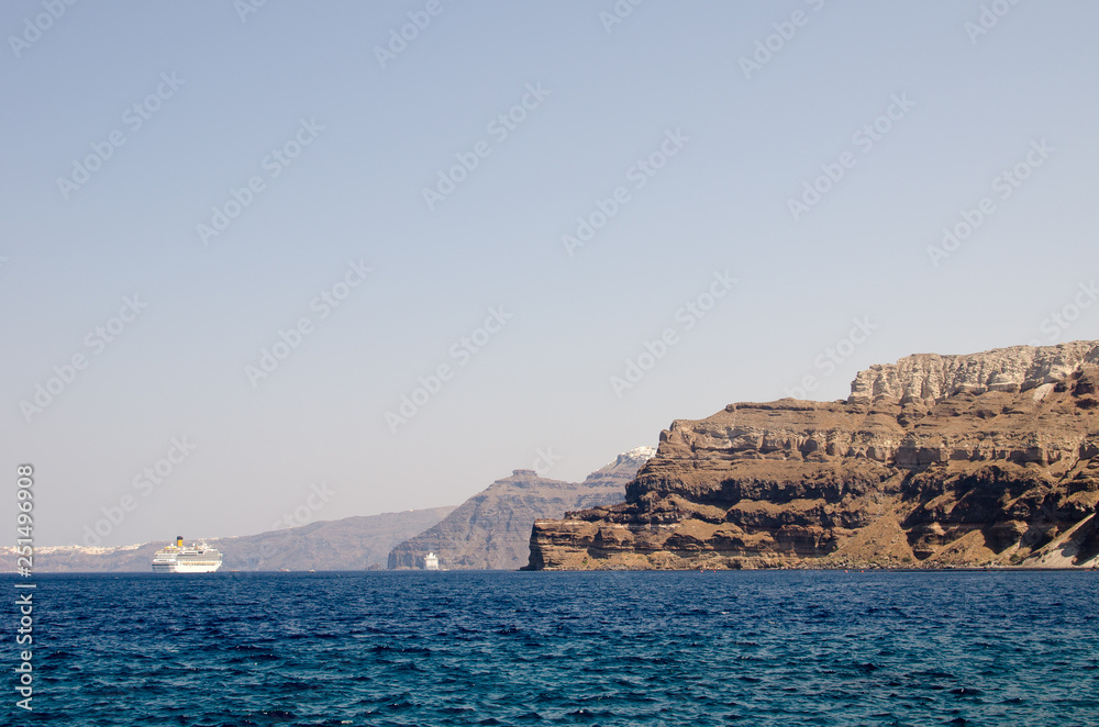 rocky coast of the santorini island in greece