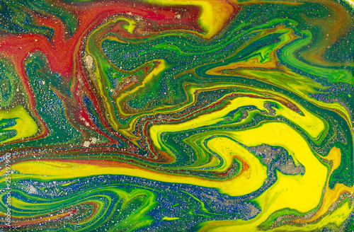 Multicolored gold marbling pattern. Golden marble liquid texture.