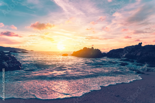 Fototapeta Naklejka Na Ścianę i Meble -  Tropical beach with sunset sky and cloud background.