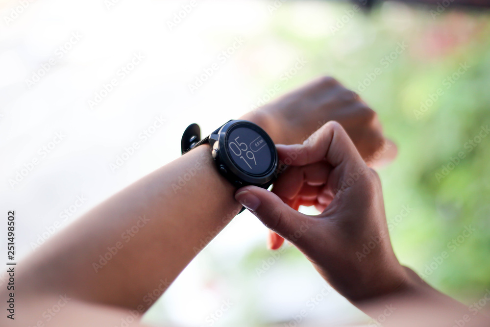 Use of fitness smart watch to monitor her performance. Use of fitness smart watch to monitor her performance.