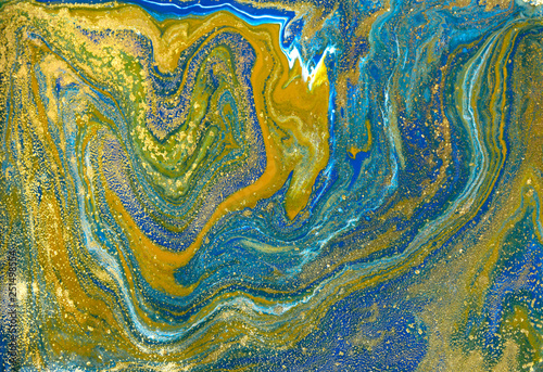 Blue and gold marbling pattern. Golden marble liquid texture.