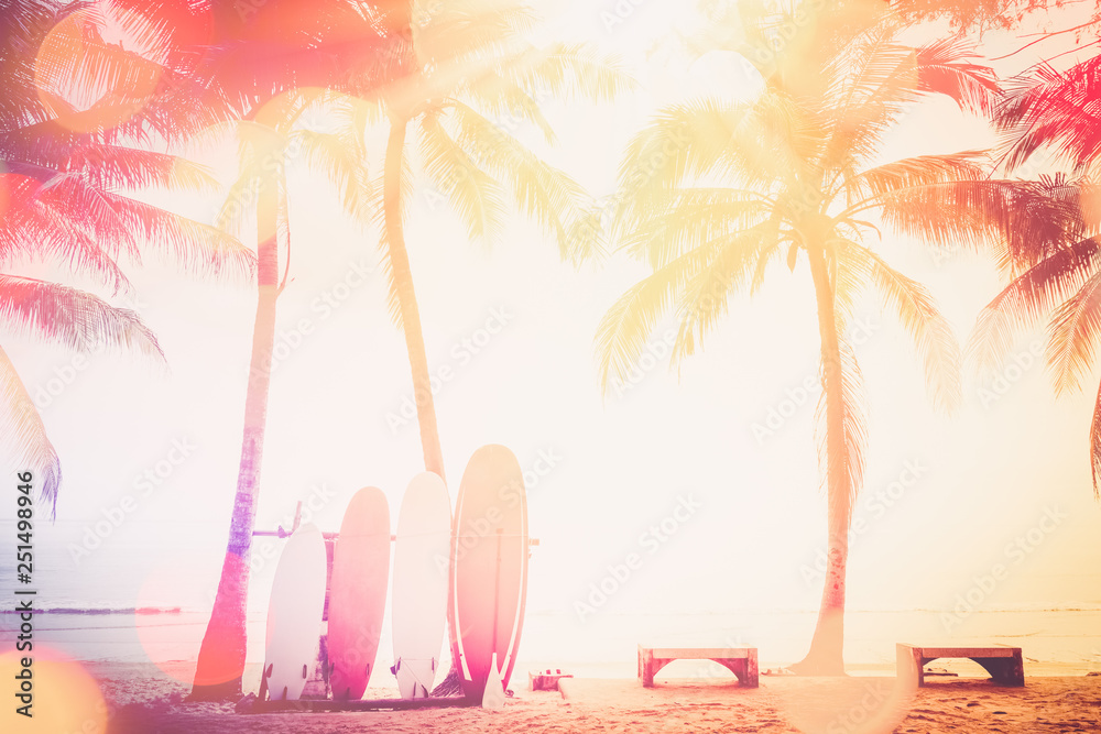 Surfboard and palm tree on beach background. Stock Photo | Adobe Stock