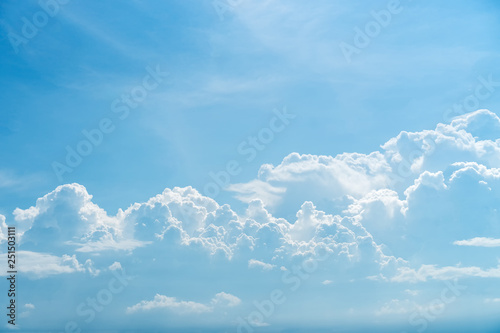 Blue sky and white clouds background. © tonktiti