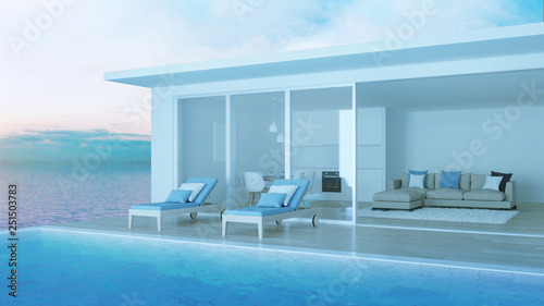 Interior of a villa with a swimming pool. House overlooking the sea. Night. Evening lighting. 3D rendering.