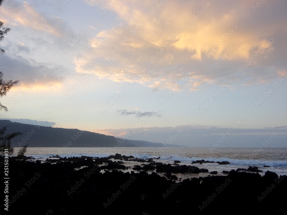 Dusk Along Rocky Shore with waves rolling in