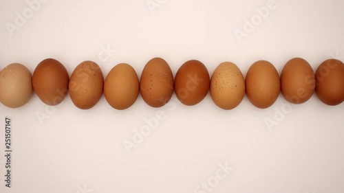 Wallpaper Mural Rolling eggs moving on a white background. Stop motion animation. Torontodigital.ca