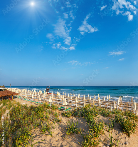 Sunshiny paradise white sandy beach, Puglia, Italy
