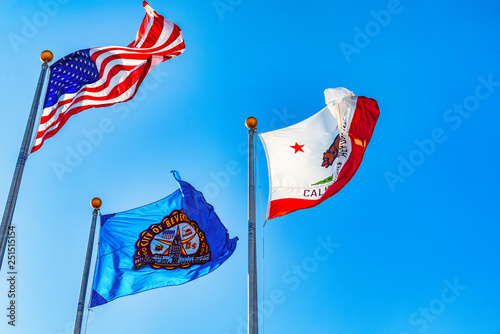 Three flags in front of Beverly Hills City Hall. Los Angelos, California.