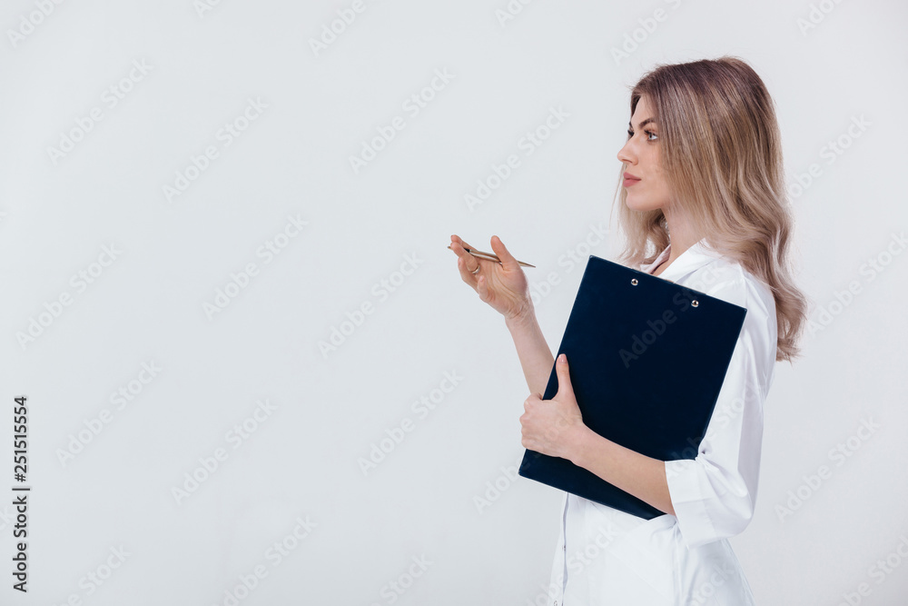 Medical physician doctor woman in white coat holding folder with documents and talking to someone Medical physician doctor woman in white coat holding folder with documents and talking to someone