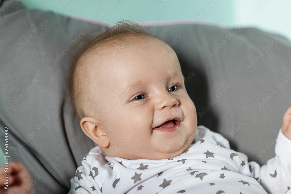 Portrait of a little baby who laughs Portrait of a little baby who laughs