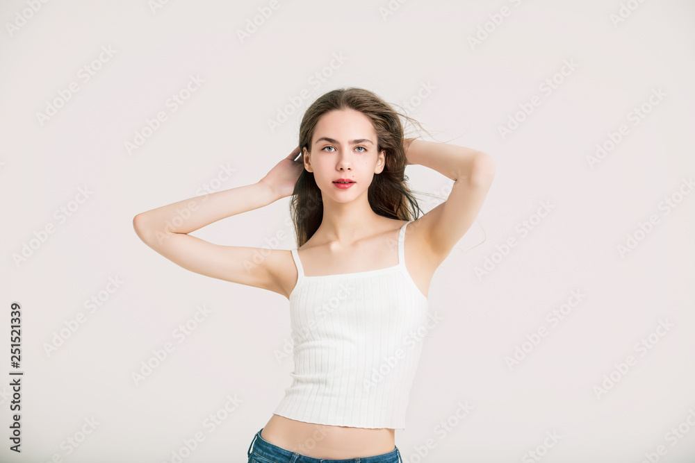 Model beautiful young girl with blond hair and blue eyes fashionable portrait in the Studio Model beautiful young girl with blond hair and blue eyes fashionable portrait in the Studio