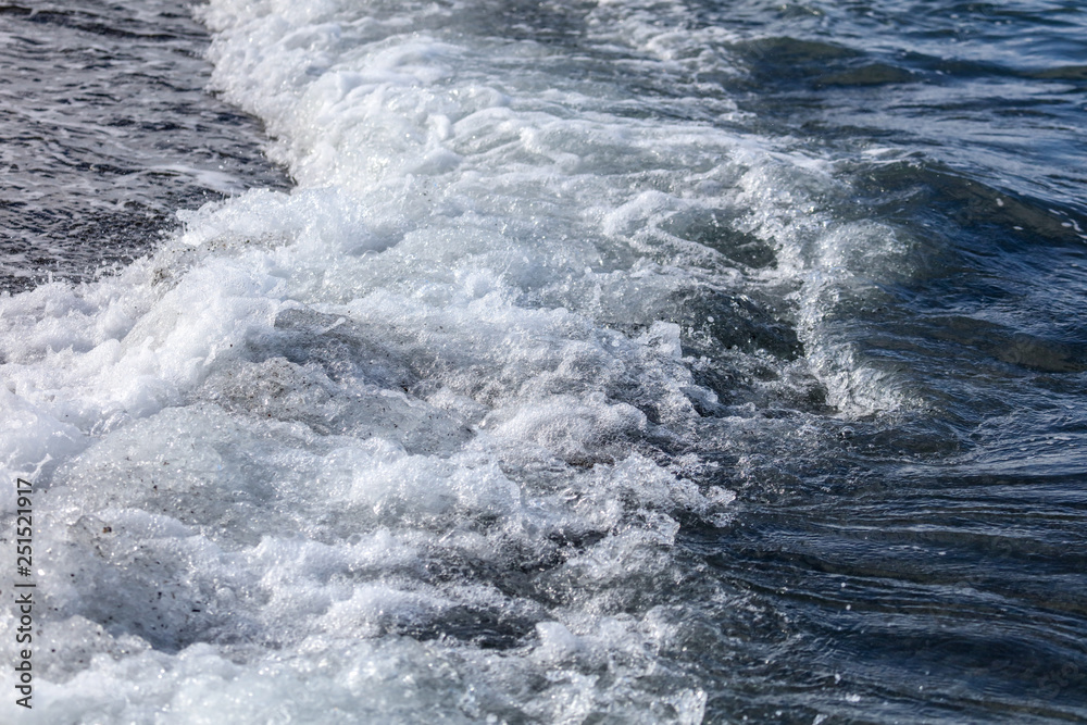 Waves on the seashore as an abstract background Waves on the seashore as an abstract background