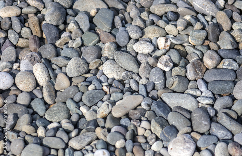 Stone pebbles on the seashore as an abstract background Stone pebbles on the seashore as an abstract background