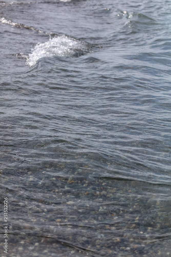 Waves on the seashore as an abstract background Waves on the seashore as an abstract background