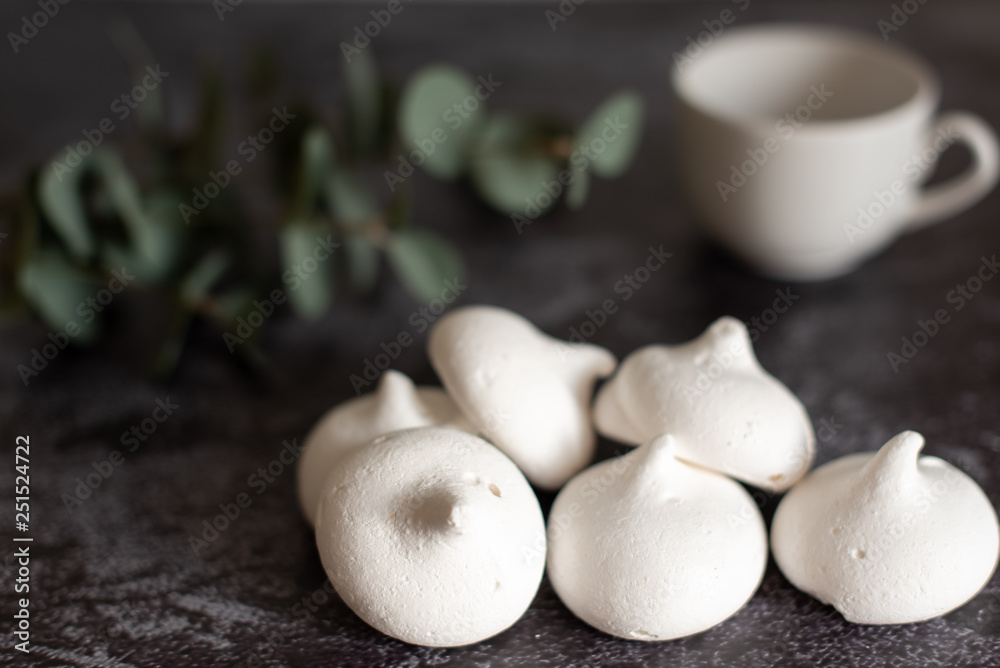 white meringue on a dark background white meringue on a dark background