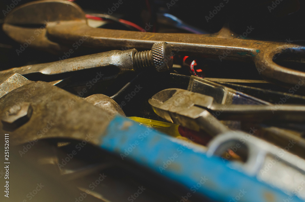 Fototapeta premium A close up view of the big old pile of the vintage craft style tools in the shop.