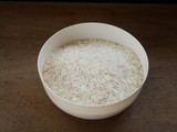 white rice in a wooden bowl