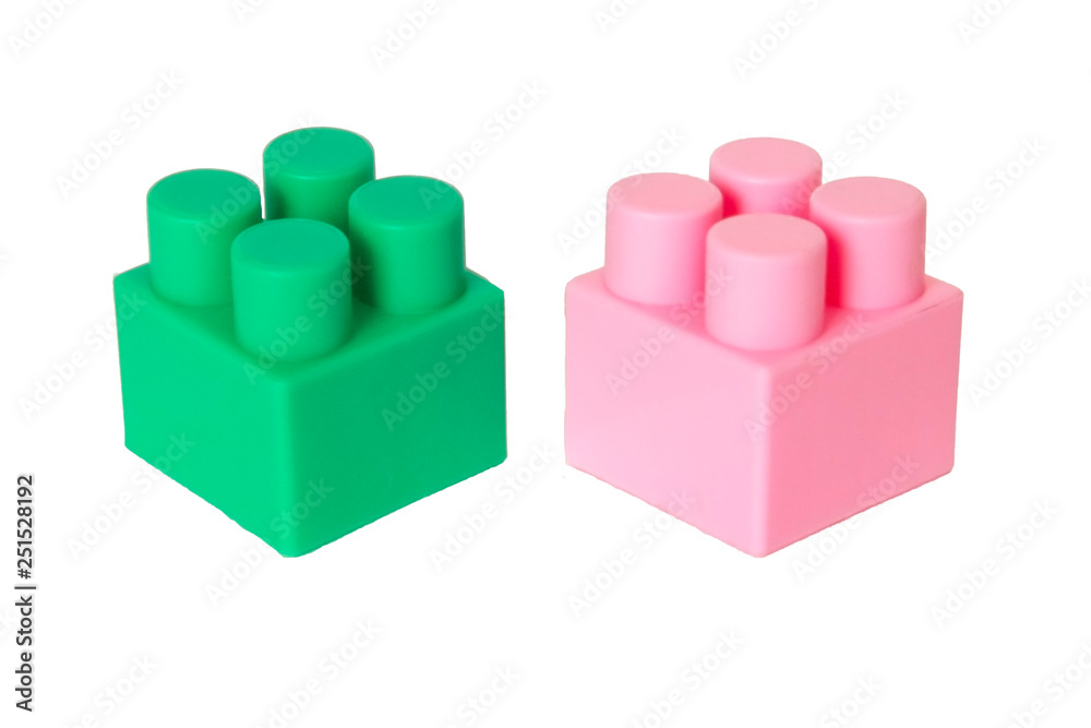 details of a children's plastic constructor on a white background. colored cubes. block. details of a children's plastic constructor on a white background. colored cubes. block.