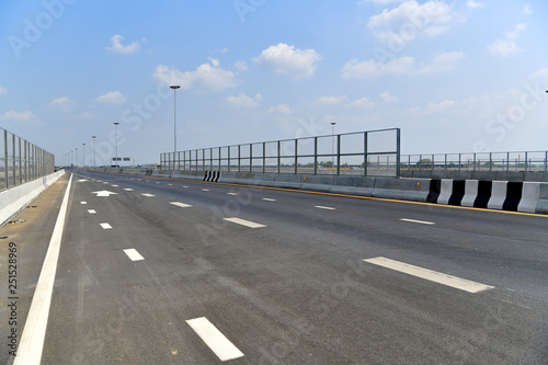 Fototapeta Naklejka Na Ścianę i Meble -  A transparent sound barrier or protection barrier at a highway