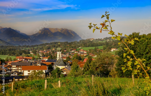 bavarian village with mountain background photo