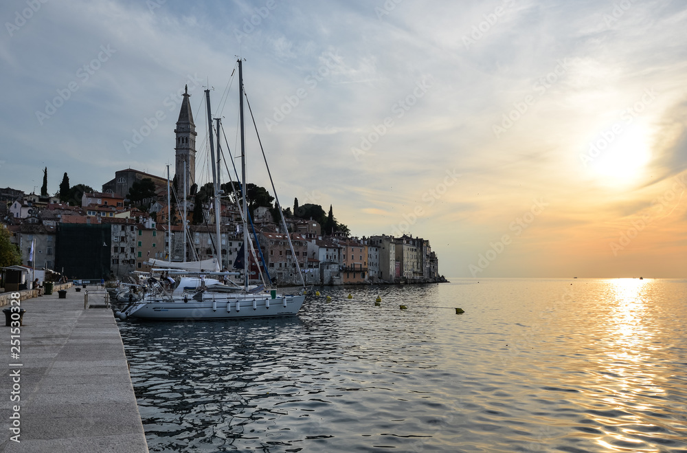 Evening view on Pier and yachts in coastal town of Rovinj, Istria, Croatia.