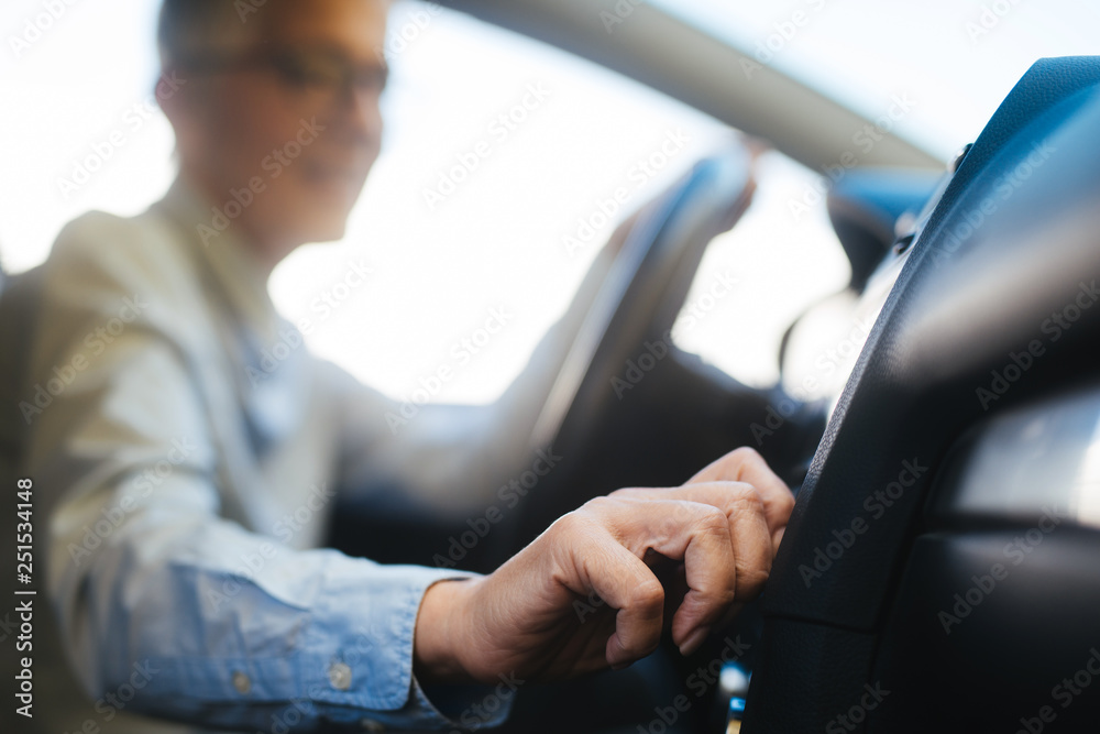 Mature women at car 