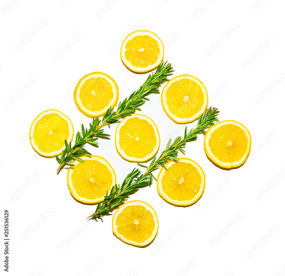 Lemon slices with Rosemary leaf isolated on white background Lemon slices with Rosemary leaf isolated on white background