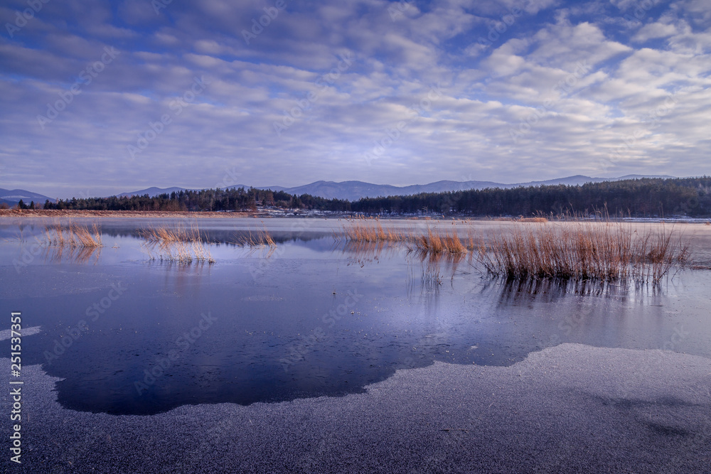 Fototapeta premium sunrise over a dam