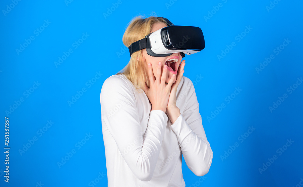 Young woman using a virtual reality headset with conceptual network lines.3d technology, virtual reality, entertainment, cyberspace and people concept. VR experience. Young woman using a virtual reality headset with conceptual network lines.3d technology, virtual reality, entertainment, cyberspace and people concept. VR experience.