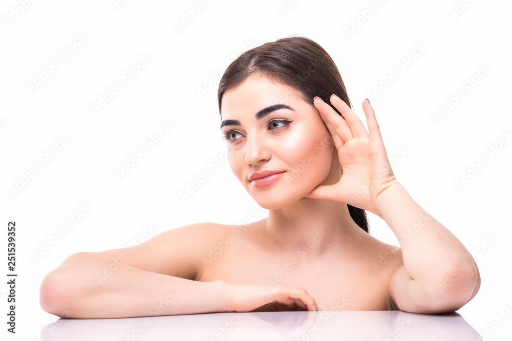 Portrait of young beautiful caucasian woman touching her face isolated over white background. Cleaning face, perfect skin. SPA therapy, skincare, cosmetology and plastic surgery concept Portrait of young beautiful caucasian woman touching her face isolated over white background. Cleaning face, perfect skin. SPA therapy, skincare, cosmetology and plastic surgery concept