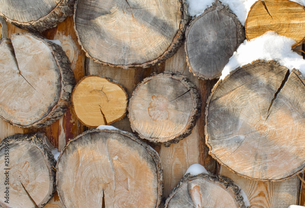 Wooden natural sawn a logs closeup, texture for background, top view Wooden natural sawn a logs closeup, texture for background, top view