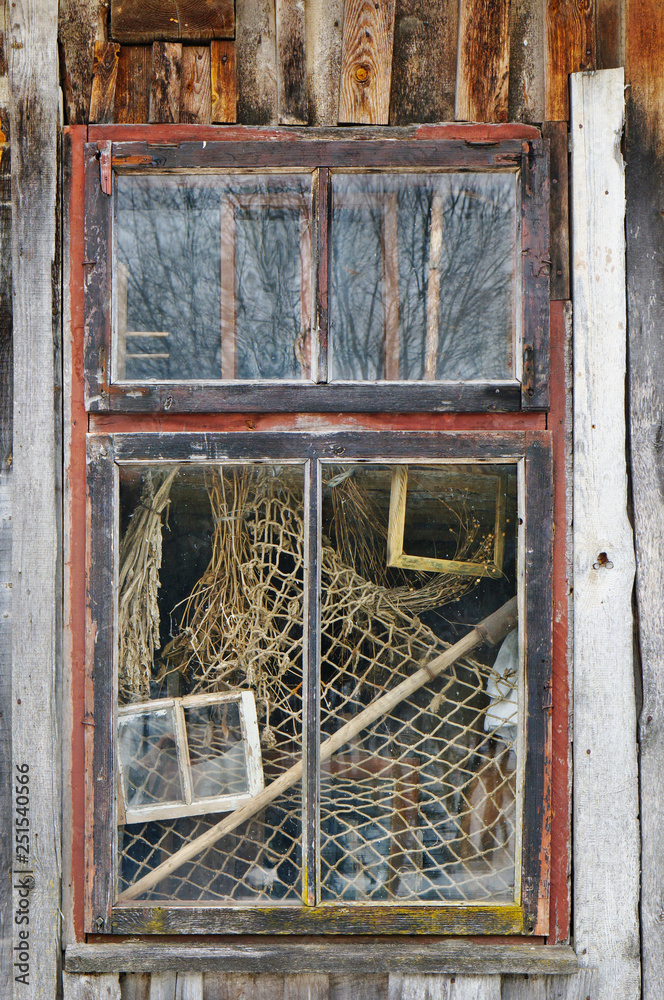 The window of the old ruined village house in which the fisherman once lived The window of the old ruined village house in which the fisherman once lived