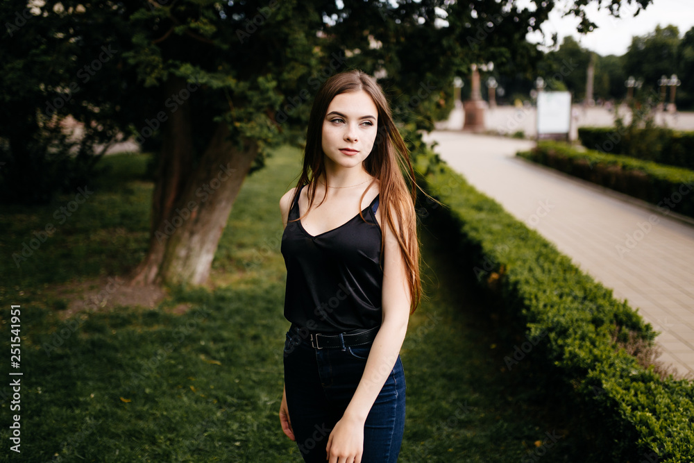 young girl posing on a street in the city young girl posing on a street in the city