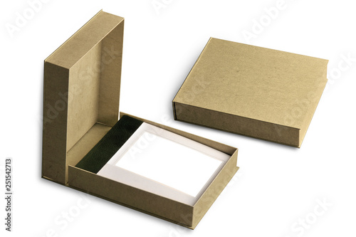 a cardboard box with a pictures album inside