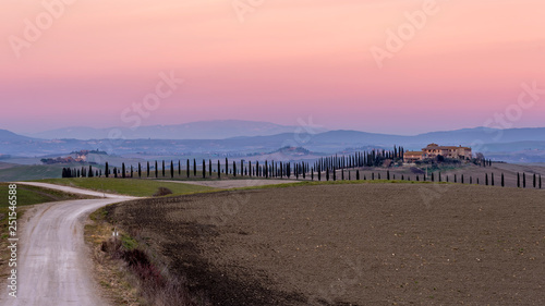 Glorious sunset over the Tuscan countryside in Ville di Corsano, Siena, Italy