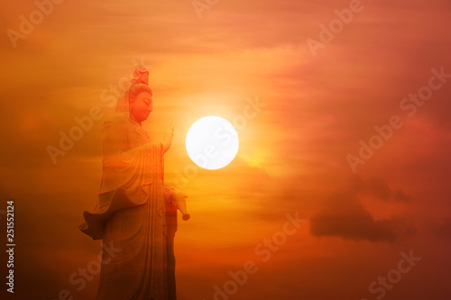 Guanyin statue made of  jade.white photo